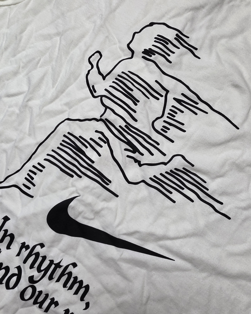 Nike "In Rhythm, We Find Our Pace" Graphic Tee